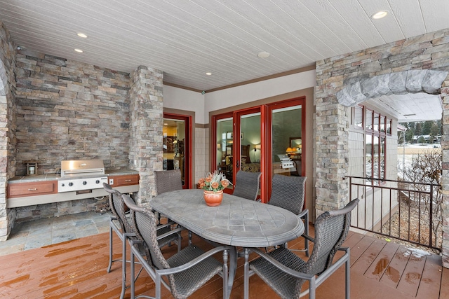 dining space featuring light hardwood / wood-style floors, wood ceiling, crown molding, and french doors