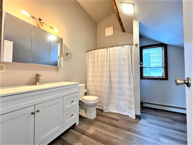 bathroom with vanity, a baseboard heating unit, vaulted ceiling, hardwood / wood-style flooring, and toilet