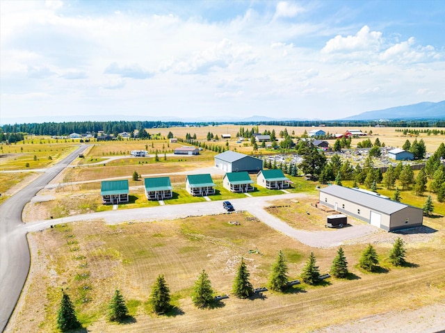 aerial view featuring a mountain view and a rural view