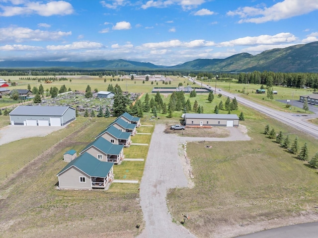 bird's eye view with a mountain view and a rural view