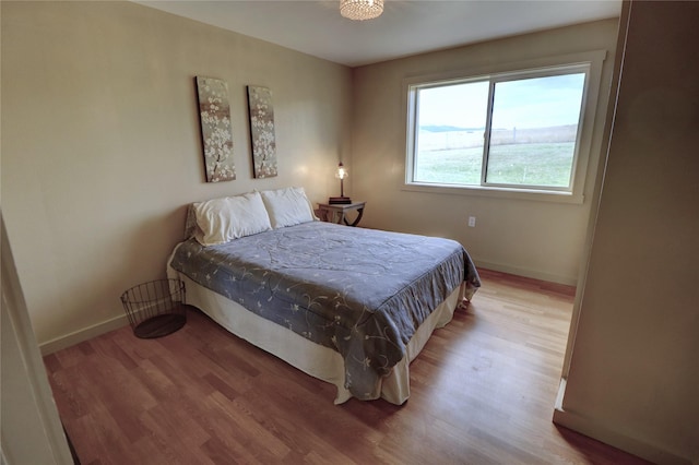 bedroom featuring light wood-type flooring