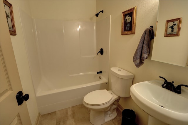 full bathroom featuring  shower combination, toilet, and sink