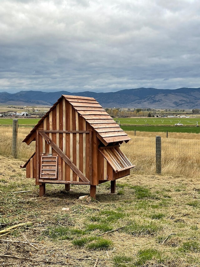 exterior space featuring a rural view and a mountain view