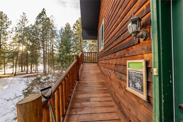 view of snow covered deck