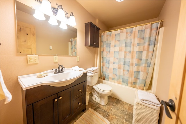 full bathroom featuring vanity, toilet, and shower / tub combo with curtain