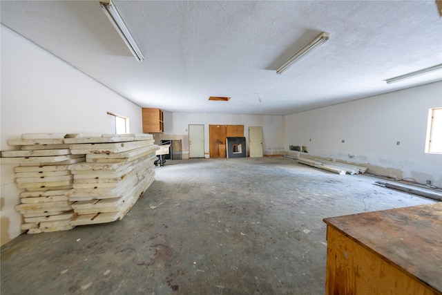 basement with a textured ceiling