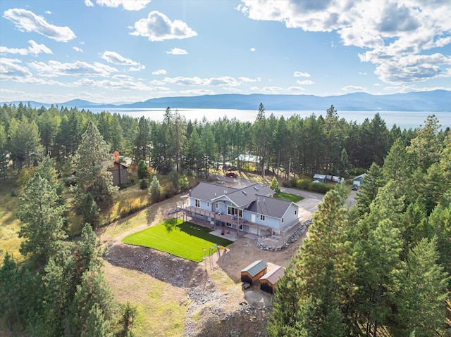 birds eye view of property with a mountain view