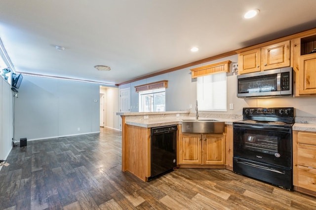 kitchen with black appliances, sink, ornamental molding, dark hardwood / wood-style flooring, and kitchen peninsula