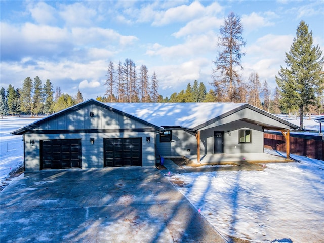 view of front of property featuring a porch and a garage