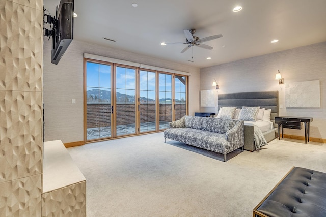 bedroom featuring access to outside, ceiling fan, and carpet floors