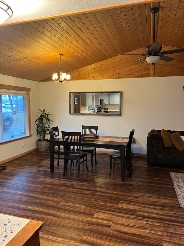 dining room featuring ceiling fan with notable chandelier, dark hardwood / wood-style flooring, vaulted ceiling, and wood ceiling