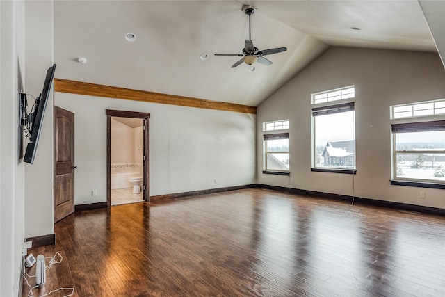 unfurnished living room with a ceiling fan, baseboards, high vaulted ceiling, and wood finished floors