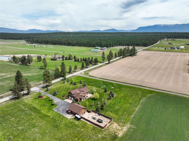 aerial view featuring a rural view and a mountain view