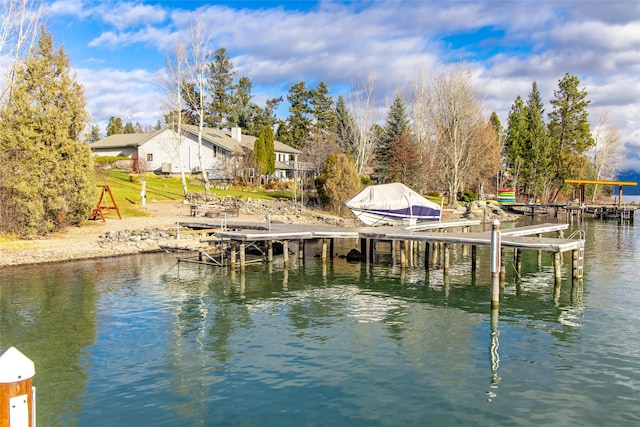 view of dock with a water view