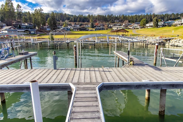 dock area featuring a water view