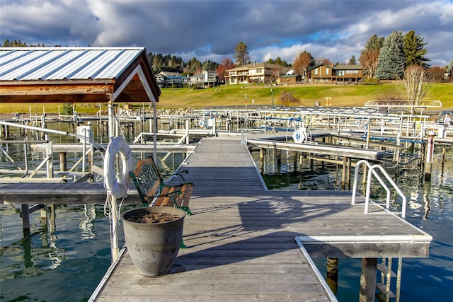 view of dock with a water view