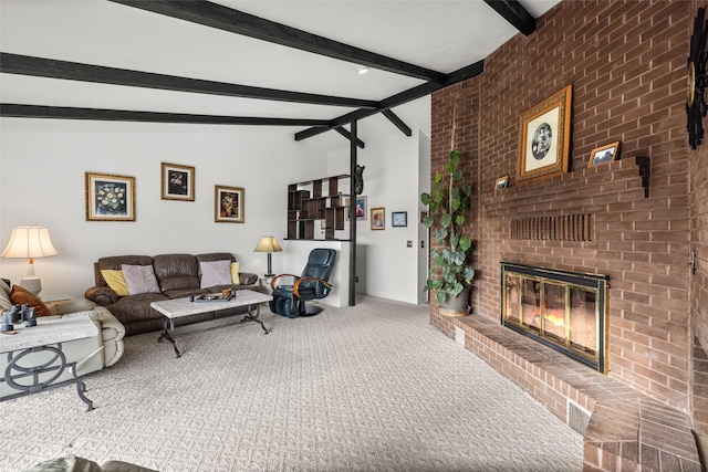 carpeted living room with a fireplace and vaulted ceiling with beams