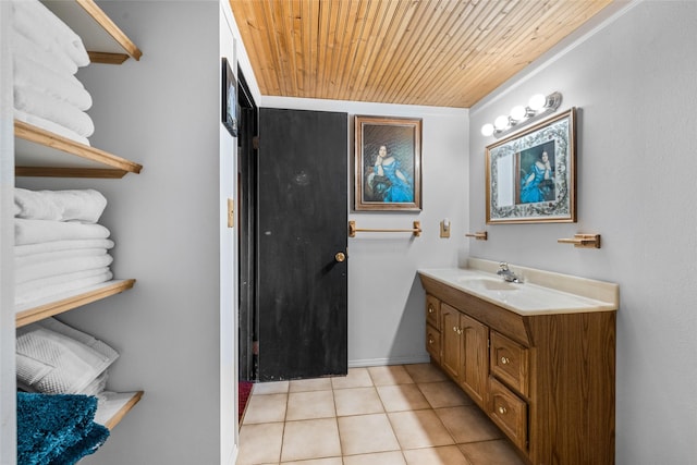 bathroom featuring tile patterned floors, vanity, and wooden ceiling