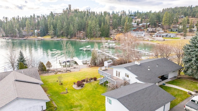 bird's eye view with a water view