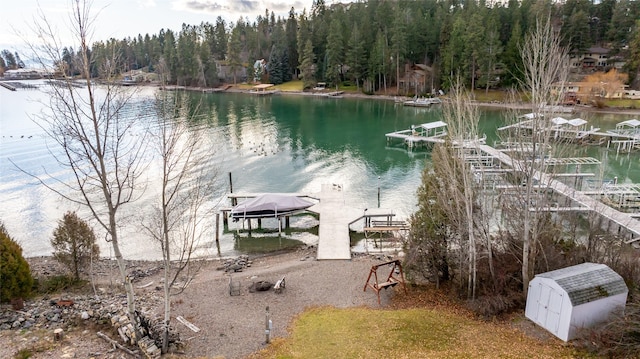 property view of water featuring a boat dock