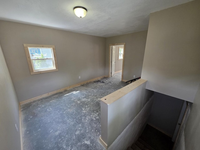 1733 S 11th St W, Missoula, MT 59801 - empty room featuring baseboards and a textured ceiling