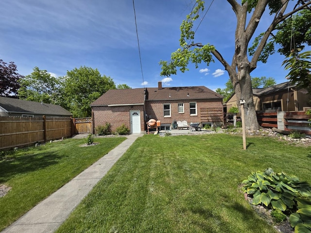 1733 S 11th St W, Missoula, MT 59801 - back of house featuring a patio area and brick siding
