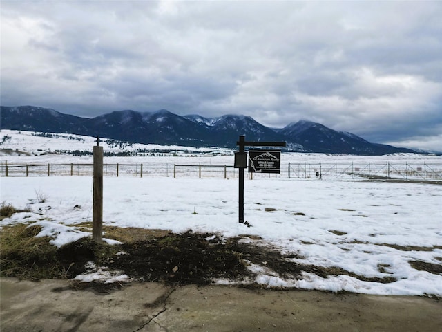 property view of mountains featuring a rural view