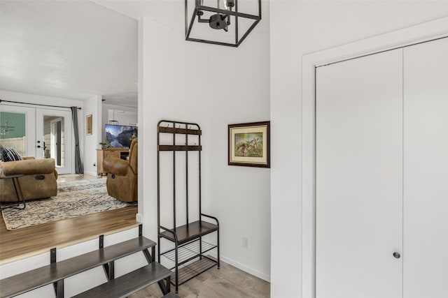 interior space featuring french doors and hardwood / wood-style flooring