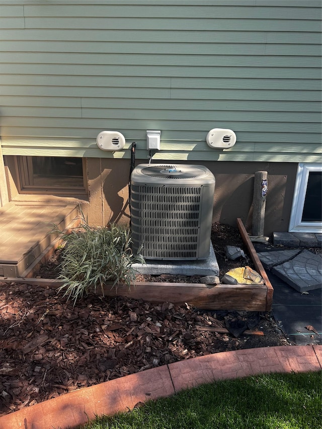 exterior details featuring central AC unit