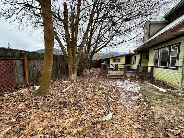 view of yard with a wooden deck