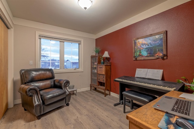 sitting room with light wood-type flooring