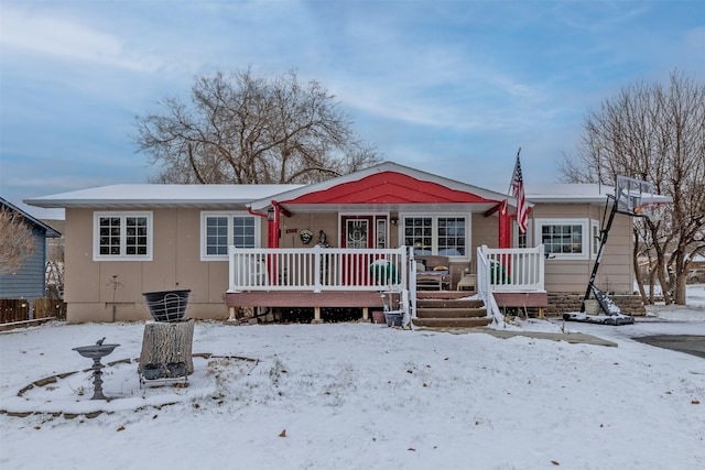 view of front of property featuring covered porch