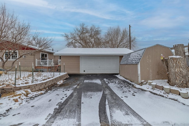 view of snow covered garage