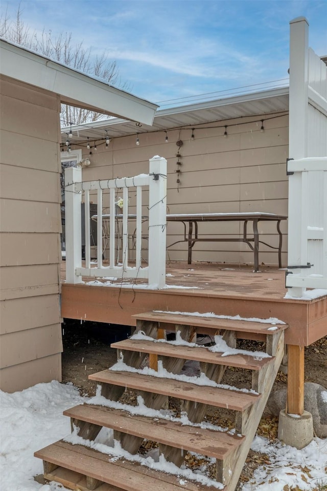 view of snow covered deck