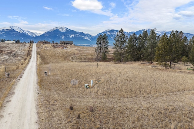 view of mountain feature with a rural view