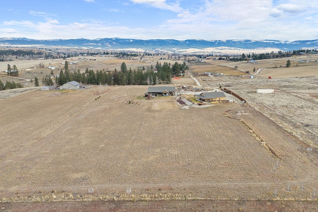 aerial view featuring a mountain view and a rural view