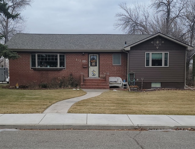 view of front of home with a front yard