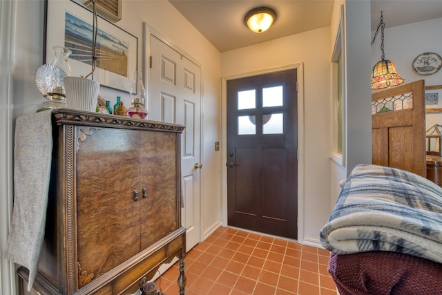 entrance foyer with tile patterned floors