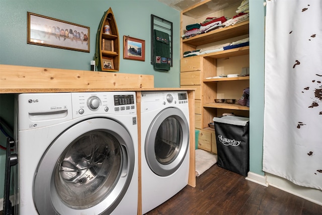 laundry room featuring independent washer and dryer and dark hardwood / wood-style flooring