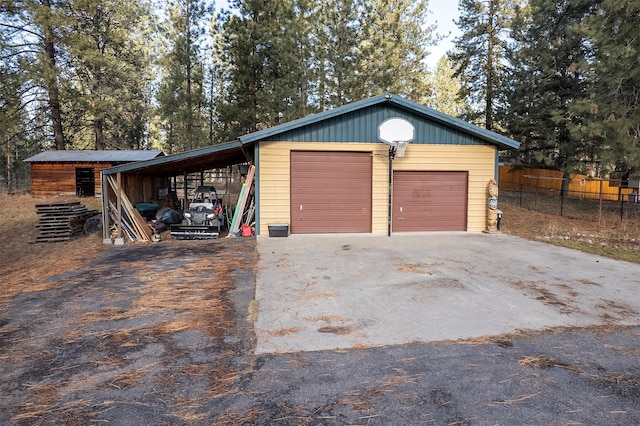 garage featuring a carport