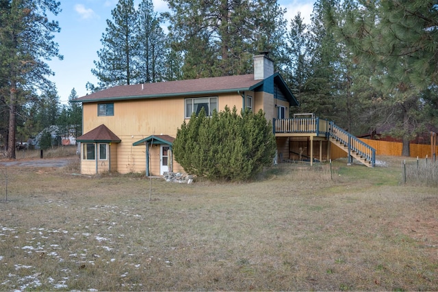 rear view of house with a deck