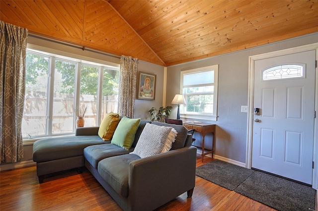 living room with dark hardwood / wood-style floors, plenty of natural light, wood ceiling, and vaulted ceiling