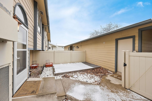 view of snow covered patio