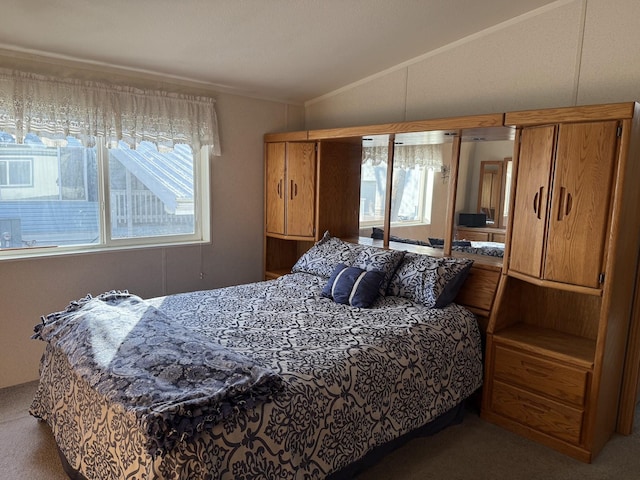 bedroom featuring crown molding, carpet, multiple windows, and vaulted ceiling