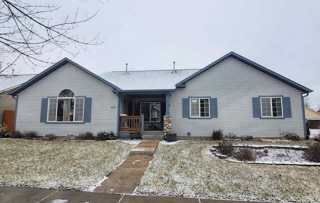 single story home with covered porch