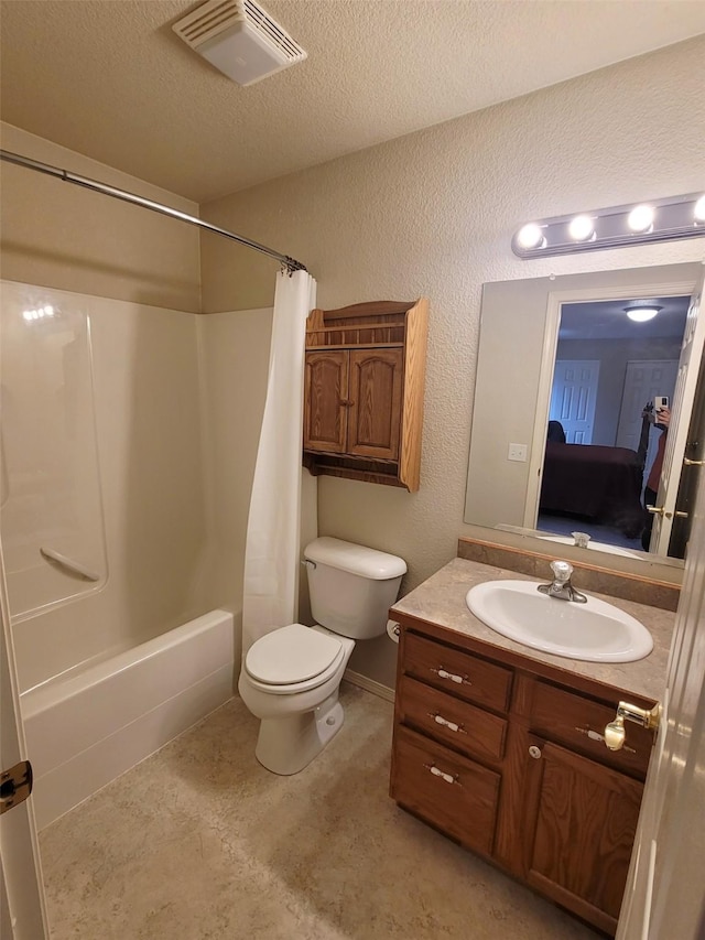 full bathroom with vanity, toilet, shower / bathtub combination with curtain, and a textured ceiling