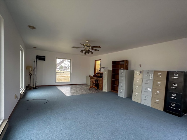 interior space featuring carpet floors and ceiling fan