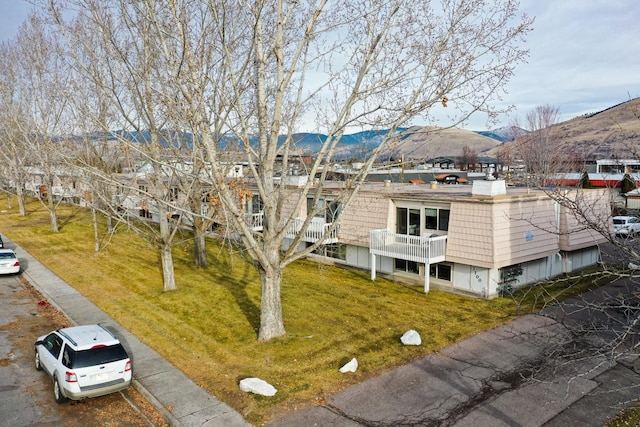 exterior space featuring a mountain view