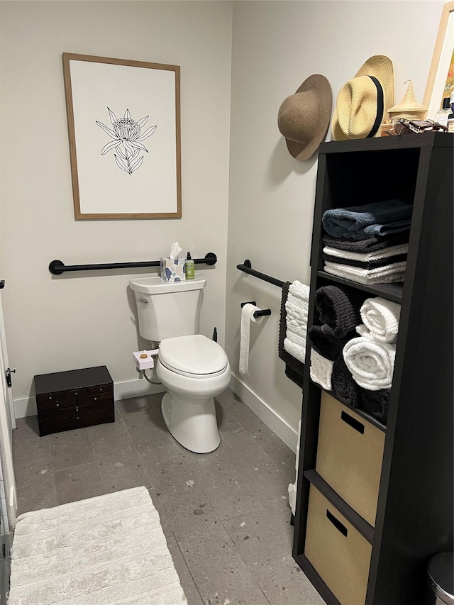 bathroom featuring toilet