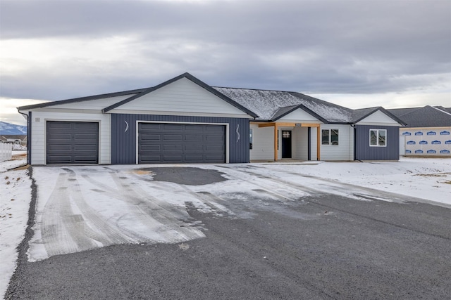 ranch-style home with a garage